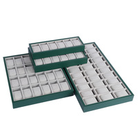 Plateau de présentation de montres en cuir vert émeraude haut de gamme à 12 emplacements, intérieur en velours gris de qualité supérieure, vitrine professionnelle pour montres