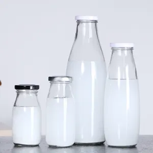 Wholesale Empty 200 Ml 250 Ml 500 Ml 16 Oz 1 Liter Milk Storage Packaging Glass Bottles With Lid