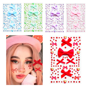 Autocollants en gros pour maquillage de scène et festivals pour filles : pierres précieuses faciales, nœuds, pierres précieuses pour cheveux, autocollants en <span class=keywords><strong>strass</strong></span> en forme de cœur non collants pour le <span class=keywords><strong>visage</strong></span> - Product Image 1