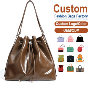 Bolso de Hombro de Cuero Genuino con Acabado Encerado de Alto Brillo, Cierre con Cordón Ajustable, Silueta Relajada, Personalizable - Product Image 1