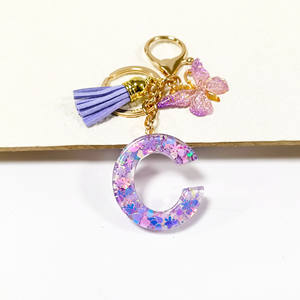 Púrpura copo de nieve corazón resina lentejuelas epoxi acrílico llavero inglés letra diseño estudiante <span class=keywords><strong>mujer</strong></span> bolso encanto colgante - Product Image 1