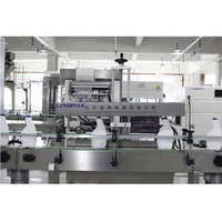 Machine de remplissage automatique multifonctionnelle haute précision pour liquides visqueux (shampoing, détergent, nettoyant WC, boissons) et produits en verre