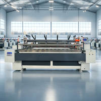 Machine à haute vitesse pour la fabrication de serviettes de cuisine et de papier toilette avec système de laminage par colle