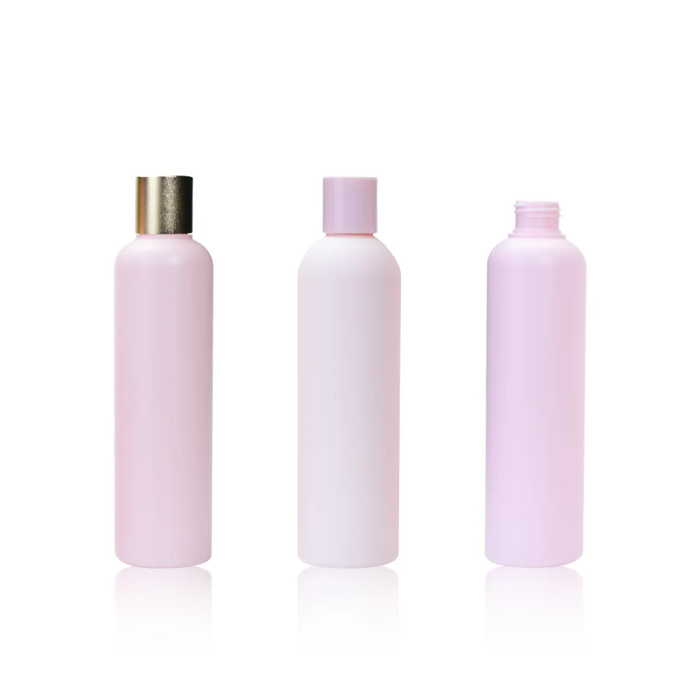 wholesale custom pink durable round shoulder round plastic lotion bottle with lids