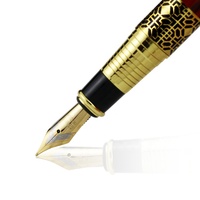 Stylo à bille personnalisé avec logo gravé en or, largeur d'écriture de 1,0 mm, cadeau d'affaires haut de gamme