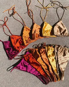 OEM Yanyixuan 2021 famous brands designer swimsuits bikini sets for women luxury satin shiny bikini swimwear