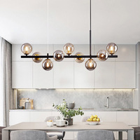 Lustre LED moderne minimaliste APCITL avec design sphérique en verre et métal, éclairage à économie d'énergie pour restaurants et hôtels