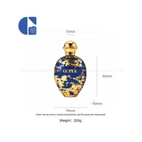 Flacon de parfum ovale de luxe oriental bleu foncé avec feuille d'or, contenant en verre pour parfum de niche de luxe, bouchon doré, logo personnalisé