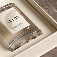 Boîte à parfum rigide de style livre blanc magnétique premium personnalisée avec insert ajusté pour présentation et emballage cadeau de parfum