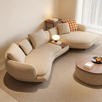 Canapé d'angle minimaliste incurvé et durable avec fonction inclinable, en tissu polaire Teddy, pour salon