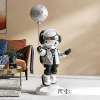 Statues de bureau en résine de plateau de combinaison spatiale d'astronaute