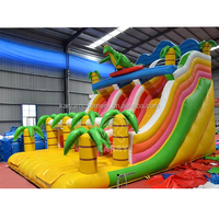 Château gonflable tropical d'extérieur, parc à dinosaures, château gonflable à double piste, toboggan aquatique gonflable pour piscine creusée avec souffleur