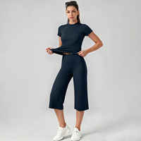 Ensemble d'entraînement 2 pièces pour femme, été, effet seconde peau, haute élasticité, manches courtes, pantalon capri large, couleur unie