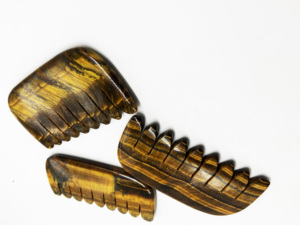 Ojo de tigre peine masaje logotipo personalizado cabeza masajeador con caja de alta calidad Ojo de Tigre guasha - Product Image 2