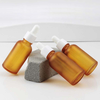 Hersteller Maßgefertigte Leere Kosmetik-Mattglasflasche Bernsteinfarben 30ml/50ml/100ml Glas-Tropfflasche Anpassbare Farbe Kunststoff/Aluminium