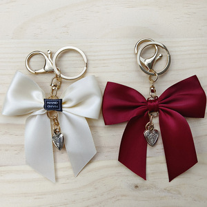 Luxe Cheer Ruban Arc Porte-clés De Mode Mignon Sac À Main Sac Charme Pendentif À La Main Bowknot Porte-clés Cheerleading Coeur Porte-clés - Product Image 3