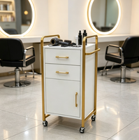 Chariot de rangement de salon de luxe en métal doré et noir, chariot de coiffure et de beauté avec tiroir et armoire