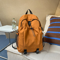 Sac à dos décontracté imperméable en nylon, grande capacité, portable, pour l'école, couleur unie, avec bretelles à coussin d'air, unisexe