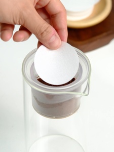 กระดาษกรอง<span class=keywords><strong>กาแฟ</strong></span>สำหรับหม้อดริป<span class=keywords><strong>เย็น</strong></span>และหม้อโมก้าพอท 100 ชิ้น ทรงกลม ผลิตในจีน - Product Image 1