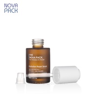 Emballage de flacon de sérum de 30ml 50ml 60ml Flacon compte-gouttes en verre ambré à bouton-poussoir Flacon d'huile facial à épaule plate