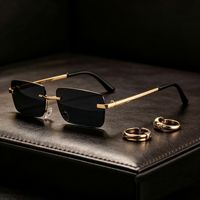 Kacamata Hitam Unisex Retro UV400 Tanpa Bingkai Model Kotak Kecil High-End, Trendi dan Modis