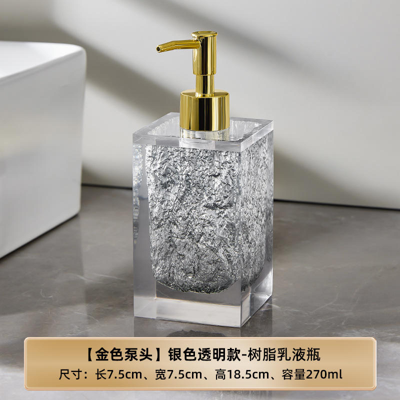 Silver-gray/golden pump head