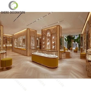 Custom Luxury Jewelry Store Display Showcase Set Gold Stainless Steel Glass Counter with LED Light for Diamond Shop Decoration - Product Image 2