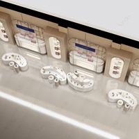 Vitrine moderne pour sacs à main, présentoir mural personnalisé en acier inoxydable, vitrines en verre pour les centres commerciaux de luxe et les magasins de détail