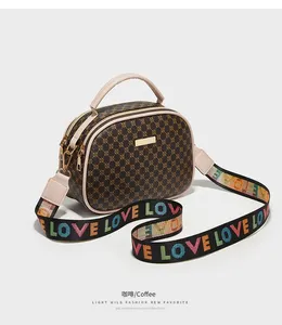 Sac à bandoulière pour femme en PU, forme seau, avec broderie à motifs variés, fermeture éclair et fermoir, sangle imprimée, style mode - Product Image 6