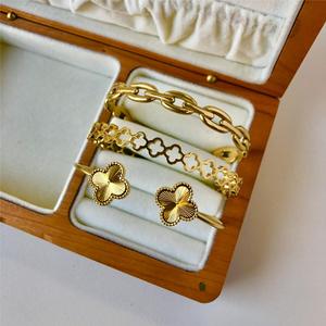 QISEN Tarnish Free 18K PVD Gold Plated Four Leaf Clover <strong>Bangle</strong> <strong>Bracelet</strong> for Women Waterproof Designer Jewelry - Product Image 1
