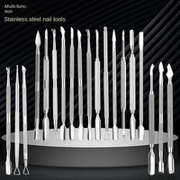 Outils de pédicure professionnels pour adultes : Pousse-cuticules et râpe à ongles double tête, durables et portables, pour l'élimination des peaux mortes.