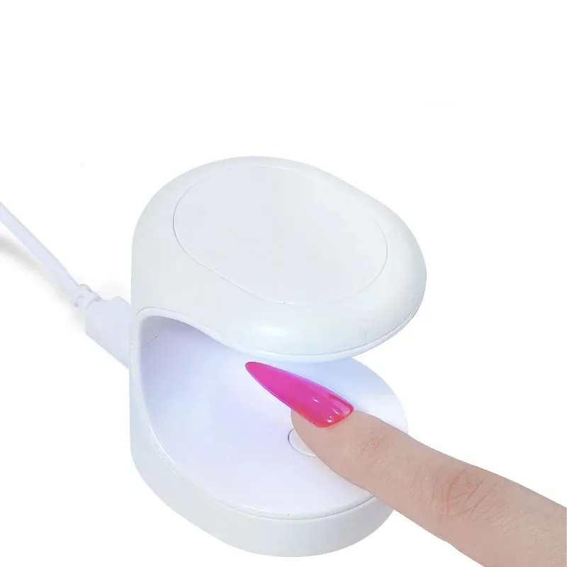 Secado rápido portátil 16W Dedo USB Forma de huevo Lámpara de uñas doble Mini secador de luz Lámpara de uñas LED UV