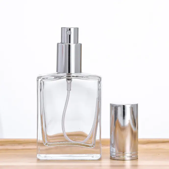 뜨거운 판매 명확한 30ml 50ml 100ml 유리 향수 병 스프레이 골드 및 은색 캡