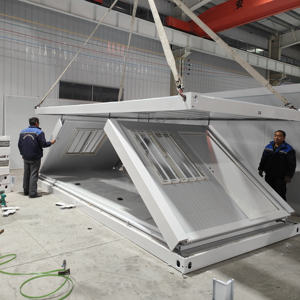 Usine Fournit des Maisons Conteneurs Pliables pour les Chantiers <span class=keywords><strong>de</strong></span> Construction <span class=keywords><strong>de</strong></span> Communautés Mobiles Alimentées à l'Énergie Solaire Imperméables et Légères - Product Image 1