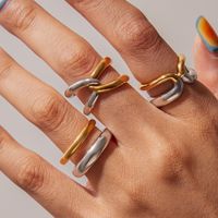 Mode féminine MW Bague étanche en acier inoxydable plaqué or 18 carats bicolore à double couche en forme de X avec lignes simples et élégantes