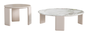 Projet de villa de luxe en Norvège, table basse moderne en HDF peinte sur mesure avec plateau rond effet marbre pour un salon élégant