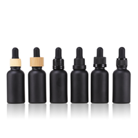 Impression de logo emballage cosmétique de soins de la peau 15ml 20ml 30ml 50ml 100ml bouteilles en verre compte-gouttes d'huile essentielle noir mat givré