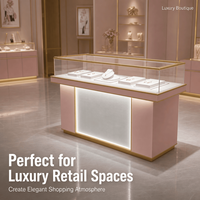 Vitrine à bijoux élégante en verre avec éclairage LED, comptoir de présentation, mobilier de magasin de bijoux en acier inoxydable sur mesure pour la vente au détail