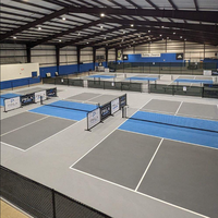 Salle de sport préfabriquée en structure métallique pour la construction de terrains de pickleball et de paddle-tennis en intérieur pour les villas