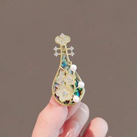Tempérament Pipa broche design rétro style costume incrusté de diamants manteau broche corsage accessoires