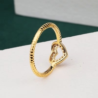 Vente en gros Nouvelle mode Bague en zircon creuse en forme de cœur pour fille mignonne Bijoux en or pour femme