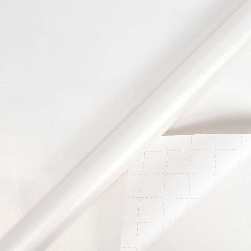 Rouleau blanc nacré - lignes de ciseaux au dos