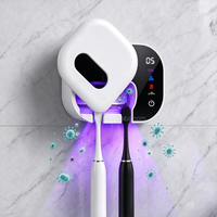 Stérilisateur mural sans fil pour brosses à dents avec capteur automatique, lumière UV et chauffage, stérilisation à 99 %, sécheur et désinfectant portable pour rasoirs