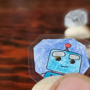 Moneda Coleccionable IW Comics 1x1 - La Primera Moneda del Robot, Producto Derivado de la Animación - Product Image 1