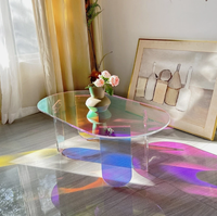 Table basse ovale en acrylique irisé Kainice, miroir signature, support de présentation unique pour salon moderne, décoration arc-en-ciel brillante pour la maison