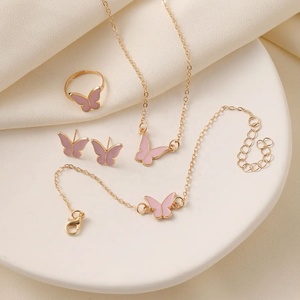 Bracelets papillon porte-bonheur pour femmes, charme en émail blanc et rose, bracelet plaqué or, collier ras du cou, bague, boucles d'oreilles, ensemble de bijoux 4 pièces - Product Image 1