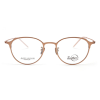 Vente en gros de lunettes en titane, monture optique ronde rétro pour dames et hommes