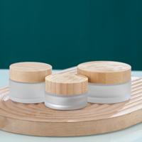 En stock pot en verre cosmétique 2.5 oz /3.5 oz pot de crème en verre dépoli avec couvercles en bambou fabricants de pots en verre