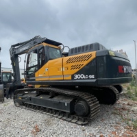 Hyundai 300LC-9S d'occasion fiable pour le défrichement forestier et la préparation de la plateforme de chargement des grumes dans les zones de exploitation forestière
