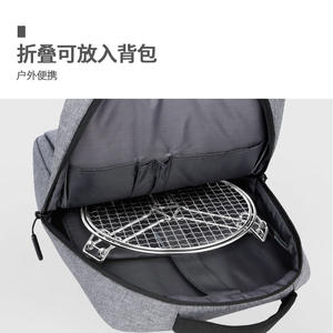 Barbecue rond en acier inoxydable pour l'extérieur, pliable et portable avec étui de transport pour le camping et les pique-niques - Product Image 1